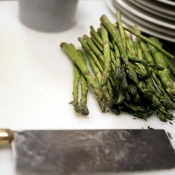 Photograph of cutting asparagus in Ginger Cafe kitchen